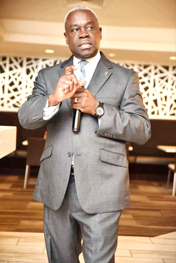 Image of Reginald Hubbard at press conference in front of 201 Poplar Criminal Justice Center.