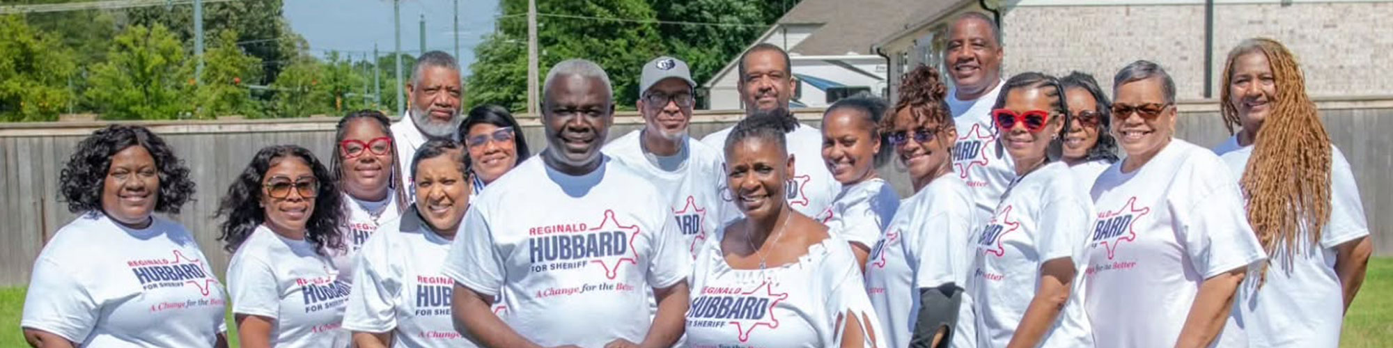 Image of Reginald Hubbard with volunteers.jpg